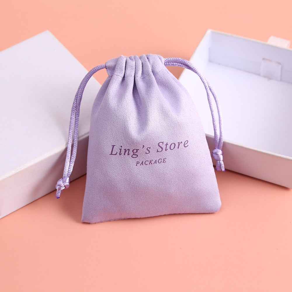 Personalisierte Flanell Schmuckbeutel mit Logo 100 Stück, helles lila / Minikauf.ch