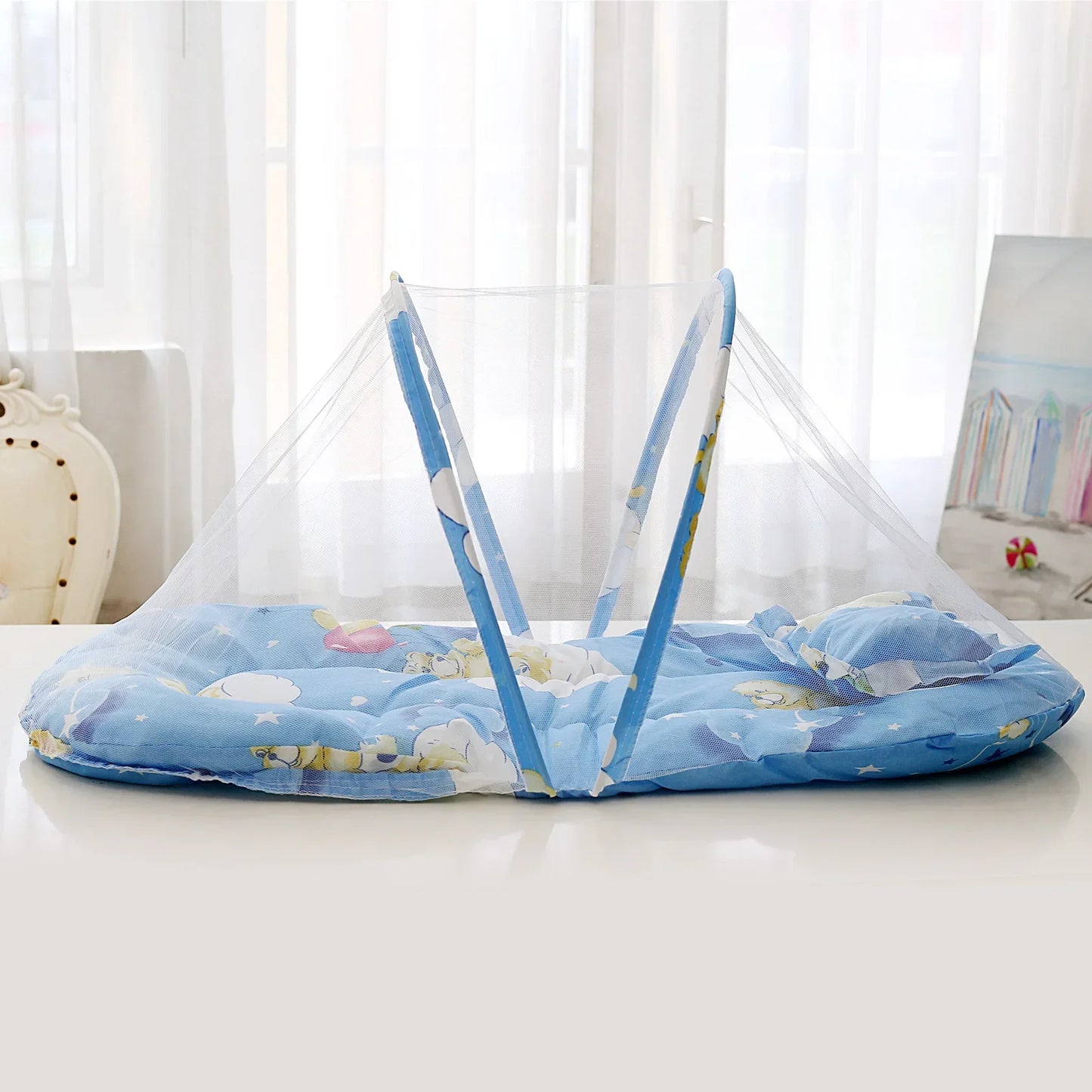 Faltbares Babybett mit Moskitonetz, Blau / Minikauf.ch