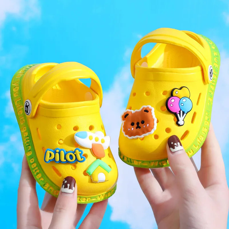 Bunte Kinder-Clogs mit süssen Cartoon-Motiven, Gelb / Minikauf.ch